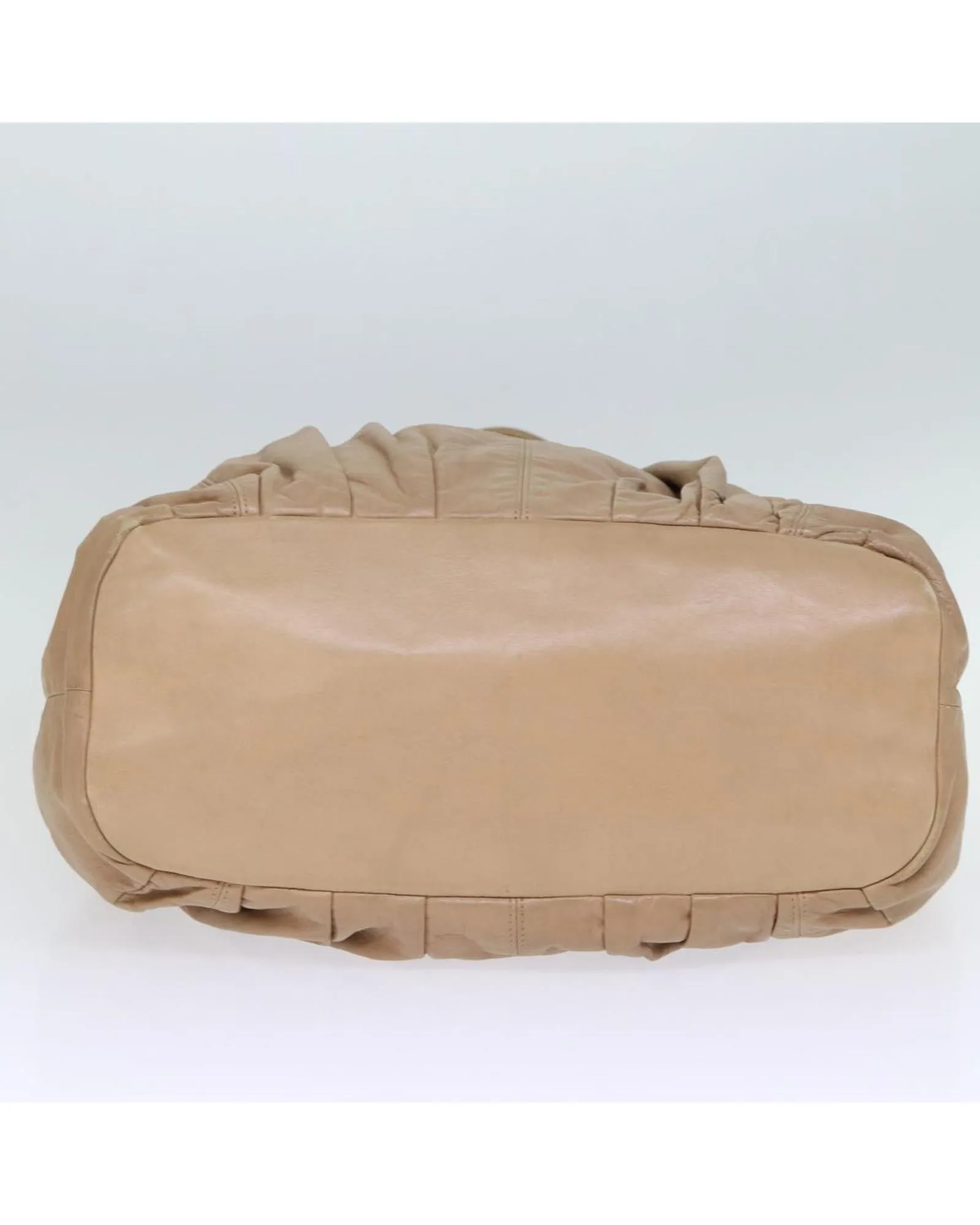 Beige Leather Tote Bag with Scratches and Rubbing