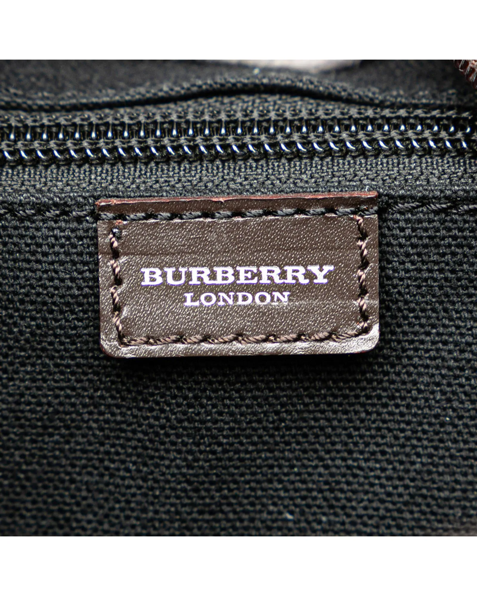 Coated Canvas Crossbody Bag with Leather Trim and Adjustable Strap